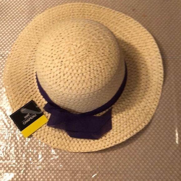 NWT TAN SUNHAT With a purple bow wrapped around it - Picture 1 of 3